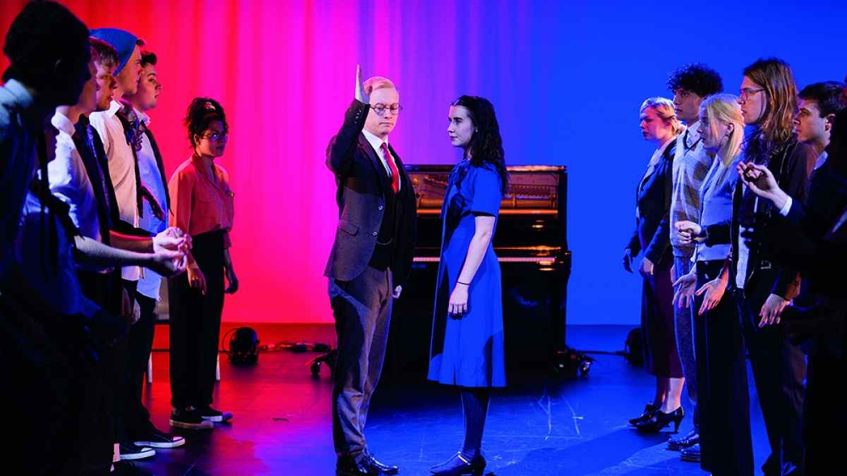 Theatrical Production by Acting Students Acting students on stage mid-performance
